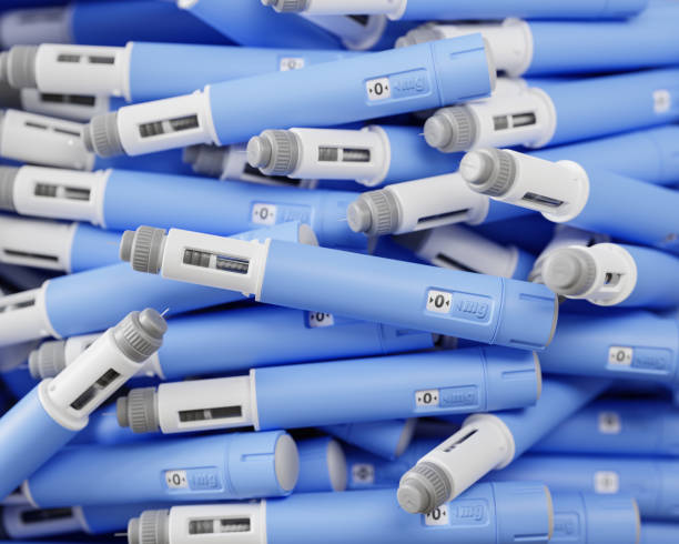 A large group of injectors / dosing pens for subcutaneous injection of antidiabetic medication or anti-obesity medication on a heap. Drugs like Ozempic for weight loss